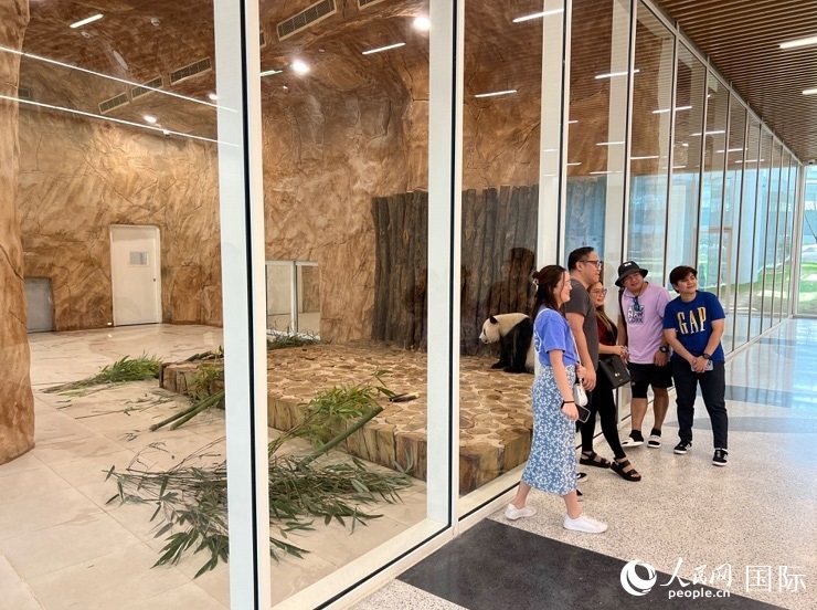 當(dāng)?shù)赜慰团c“四?！焙嫌?。人民網(wǎng)記者 張志文攝