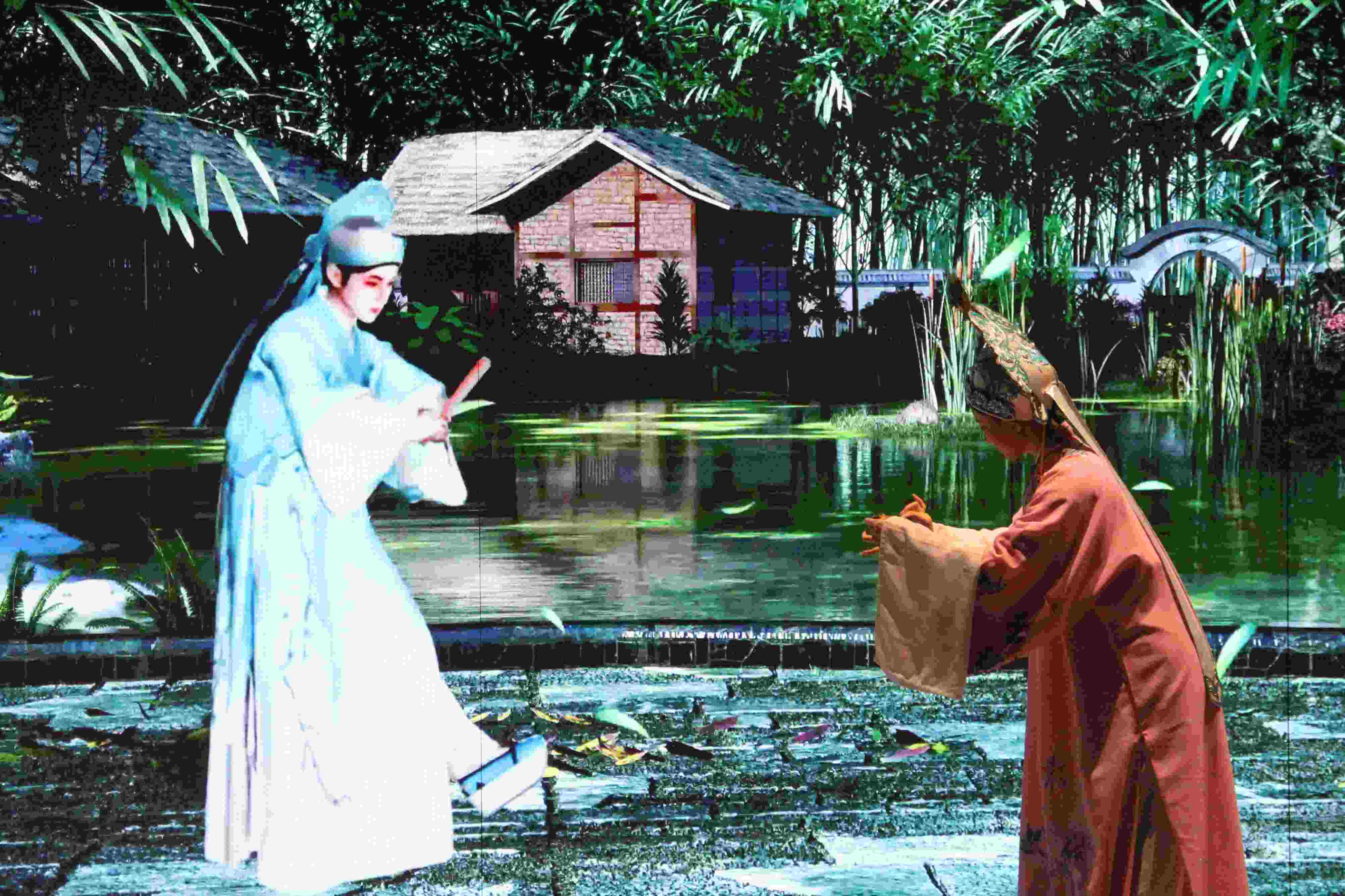 真人演員與虛擬人演員在“元啟金陵”南京數(shù)字文化客廳出演《梁山伯與祝英臺》經(jīng)典選段。受訪者供圖